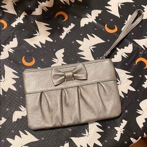 Elegant Silver Clutch with Bow Accent